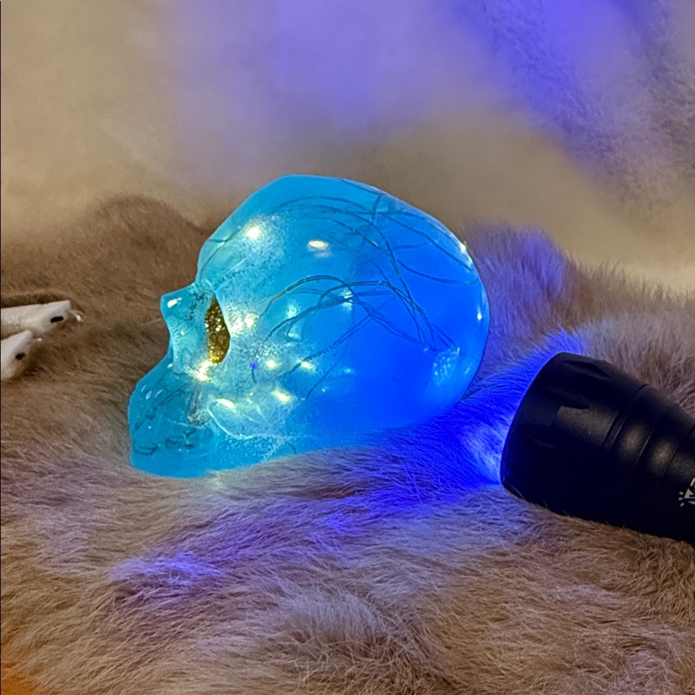Blue Glow in the Dark Light Up 4” Skull Decor with Gold Accents